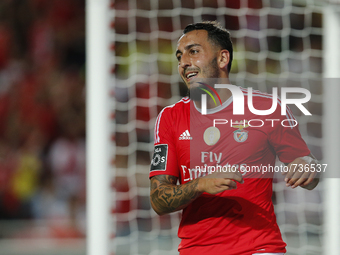 Benfica's forward Kostas Mitroglou reacts after missing a goal opportunity during the Portuguese League football match between SL Benfica an...
