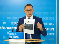 Co-leader of parliamentary group of Alternative for Germany (AfD) party Tino Chrupalla gives a statement to the media before a group meeting...