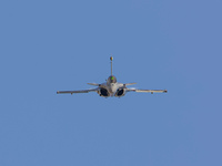 A French air force ( Armée de l'Air et de l'Espace Dassault Rafale solo display ) Dassault Rafale multirole combat fighter jet aircraft perf...