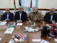 Politicians from the various Palestinian factions attend a meeting in Gaza City on November 20, 2021. - Showing support for Hamas in Britain...