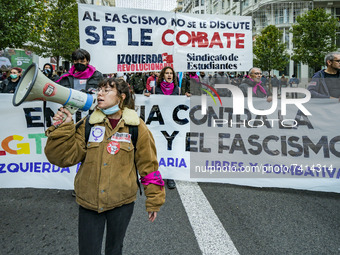 Activist with a loudhailer in a demonstration of the LGTBI collective in Madrid against the rising of the fascism in the society and in supp...