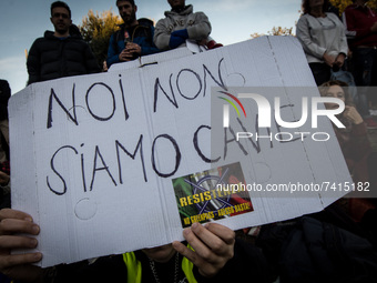 People take part in a 'No Green Pass' rally at the Circus Maximus in Rome, Italy, 20 November 2021. Italy made the green pass (EU Digital CO...