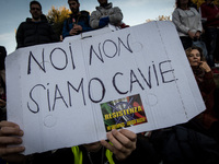 People take part in a 'No Green Pass' rally at the Circus Maximus in Rome, Italy, 20 November 2021. Italy made the green pass (EU Digital CO...