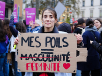 People take par tin a demonstration against violence against women, in Paris, France, on November 20, 2021. (