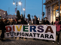 People take part in a demonstration against the transphobia and commemorating the Transgender Day of Remembrance (TDoR), in Rome, Italy, on...