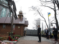 Ukrainian President Volodymyr Zelensky takes part at a commemoration ceremony at a monument of Heroes of Heavenly Hundred, activists who wer...