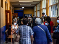 Osorno, Chile. November 21, 2021.-
Women line up to vote during the presidential elections that are held in conjunction with the elections o...