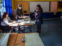Osorno, Chile. November 21, 2021.-
Delegate of the Servel supervises a voting table during the presidential elections that are held in conju...