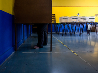 Osorno, Chile. November 21, 2021.-
Voters inside the voting booth during the presidential elections that are held in conjunction with the el...