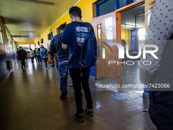 Osorno, Chile. November 21, 2021.-
People wait their turn to vote during the presidential elections that are held in conjunction with the el...
