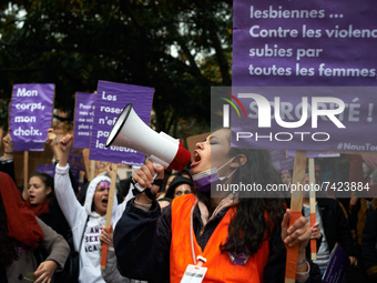 A young woman uses a megaphone during the protest. Women from the collective NousToutes organized a protest Toulouse against sexual violence...