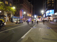 A group of Philadelphia bike cops rides out in front of marchers to block traffic from side streets leading onto Markets Street in Philadelp...
