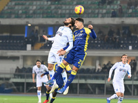 Leonardo Mancuso (Empoli) and Koray Gunter (Verona) during the italian soccer Serie A match Hellas Verona FC vs Empoli FC on November 22, 20...