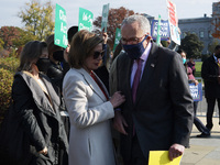 House Speaker Nancy Pelosi(D-CA) talks with Senate Majority Leader Chuck Schumer(D-NY) during the press conference about Build Back Better A...