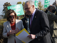 House Speaker Nancy Pelosi(D-CA) talks with Senate Majority Leader Chuck Schumer(D-NY) during the press conference about Build Back Better A...
