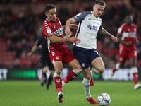 Middlesbrough's Marcus Tavernier battles with Preston's Emil Riis Jakobsen during the Sky Bet Championship match between Middlesbrough and P...