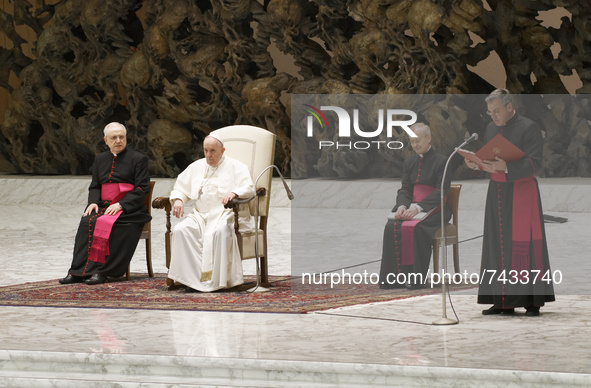 Pope Francis attends his weekly general audience in the Paul VI Hall at the Vatican, Wednesday, Nov. 24, 2021.  
