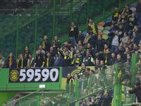 Fans of Borussia Dortmund looks on prior to the during the UEFA Champions League Group C match between Sporting CP and Borussia Dortmund at...