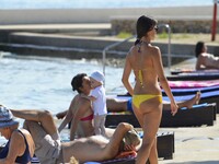 Croatian weather: Tourists and local enjoying in the summer sunshine on  21st Aug, 2015.Preko,Ugljan island,adriatic sea, Croatia (