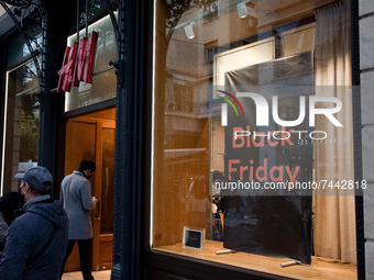 A Black Friday sales discounts sign on a window shop in the center of Athens, Greece on November 26, 2021. (