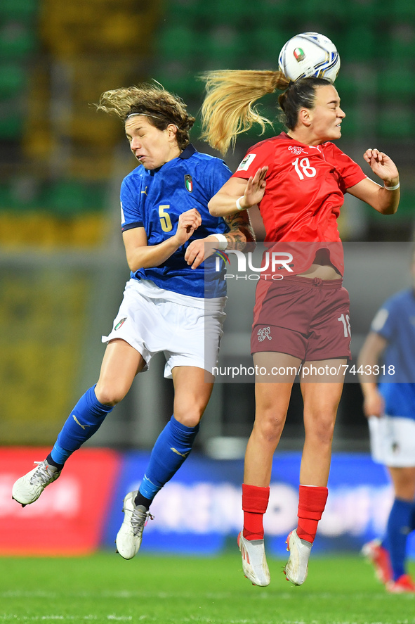 Italy's defender Elena Linari jump for the ball with Switzerland's midfielder Riola Xhemaili during the FIFA World Cup Women's FIFA Worl...