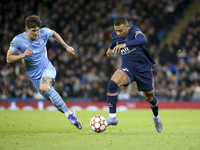 Kylian Mbappe of PSG, John Stones of Manchester City (left) during the UEFA Champions League, Group A football match between Manchester City...