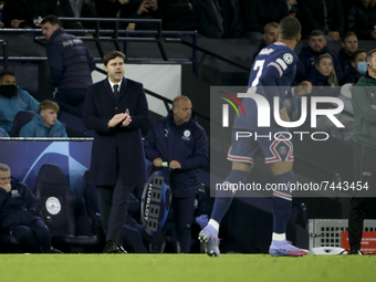 Coach of PSG Mauricio Pochettino congratulates Kylian Mbappe of PSG (right) for his goal during the UEFA Champions League, Group A football...