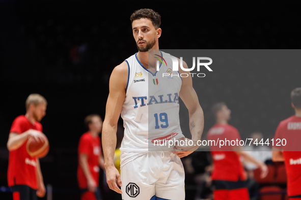 Raphael Gaspardo (C) of Italy looks on during the warm-up ahead of the FIBA Basketball World Cup 2023 Qualifying Tournament match between Ru...