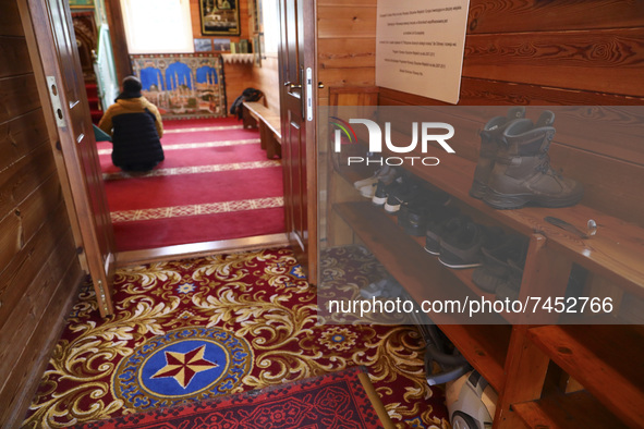 A faithful prays inside mosque in Bohoniki, Poland on November 21, 2021. Bohoniki Mosque is one of the five open mosques in Poland. It is al...