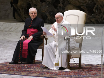 Pope Francis attends his weekly general audience in the Paul VI Hall at the Vatican, Wednesday, Dec. 1, 2021.  (