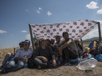 Migrants are resting at  the new refugee camp at the Macedonian-Greek border, August 23 2015, near the town of Gevgelija. Macedonia official...