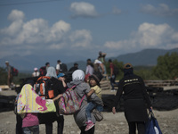 Migrants are heading towards the train station in Gevgelija, at the new refugee camp at the Macedonian-Greek border, August 23 2015, near th...