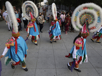 Pilgrims perform the Dance of the Quetzals outside the Basilica of Guadalupe located in the municipality of Gustavo A. Madero, Mexico City,...