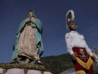 A dancer and pilgrim in the plazuela of the Monumental Virgen de Guadalupe located in the Sierra Norte de Xicotepec de Juárez Puebla, Mexico...