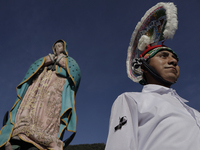 A dancer and pilgrim in the plazuela of the Monumental Virgen de Guadalupe located in the Sierra Norte de Xicotepec de Juárez Puebla, Mexico...