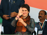 Congress leader Priyanka Gandhi Vadra waves during the party's 'Mehangai Hatao Rally' against the Central government, in Jaipur, Rajasthan,...
