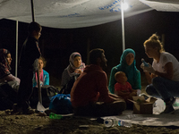 The refugees’ camp has poor facilities: only few tents for the refugees. They are waiting that local police check their ID and their Greek p...