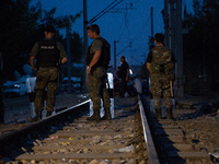 In the railway border, the local police keep the path to avoid the big mess like  3 days ago and to control the number of refugees on its te...