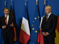 French Economy Minister Bruno Le Maire and the newly appointed German Economy Minister Christian Lindner during their joint press conference...
