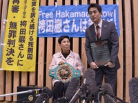 Sister of Iwao, Hideko Hakamada is conferred a WBC honor championship belt on from a Japan professional boxing association  in Tokyo April 6...