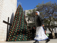  Palestinian Christians, attend a mass at the Holy Family Church in Gaza City December 19, 2021.
 (