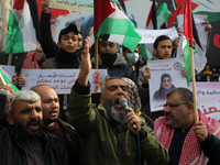Palestinians attend Friday prayer in solidarity with Palestinian prisoners in Israeli jails, in front of Red Cross office in Gaza city, on D...