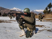 Border Security Force (BSF) soldiers taking position during patrolling at a forward post in Baramulla, Jammu and Kashmir, India on 31 Decemb...