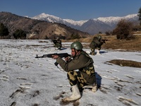Border Security Force (BSF) soldiers taking position during patrolling at a forward post in Baramulla, Jammu and Kashmir, India on 31 Decemb...