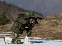 Border Security Force (BSF) soldiers taking positions during patrolling at a forward post in Baramulla, Jammu and Kashmir, India on 31 Decem...