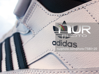 Adidas logo is seen on the shoe at the store in Krakow, Poland on December 30, 2021. (