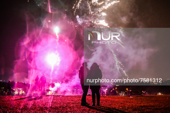 People celebrate New Year at Krakus Mound in Krakow, Poland on 1st January 2022.
 