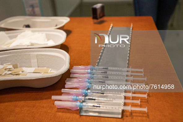 Closeup of the syringes with shot. Vaccination center in Eindhoven with 20 lanes and the capacity of 7500 vaccines per day. The jabs are adm...