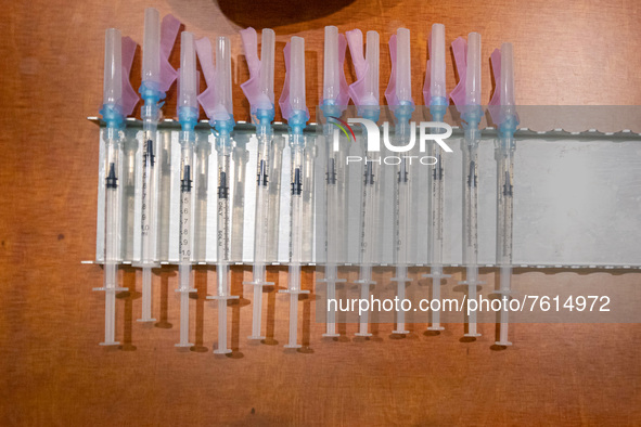 Closeup of the syringes with shot. Vaccination center in Eindhoven with 20 lanes and the capacity of 7500 vaccines per day. The jabs are adm...