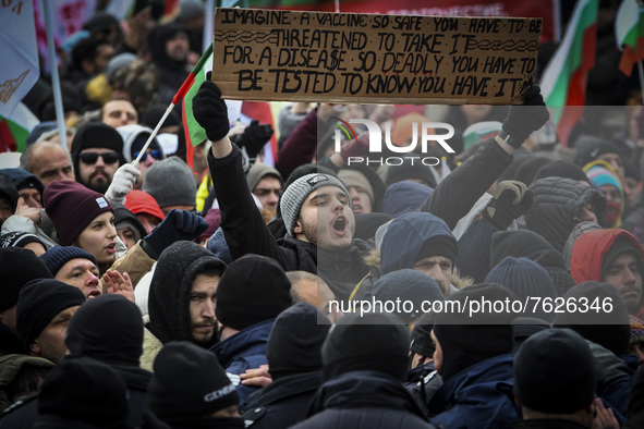 People in front of Bulgarian parliament building during protest against green certificates and vaccinations on January 12, 2022 in Sofia, Bu...